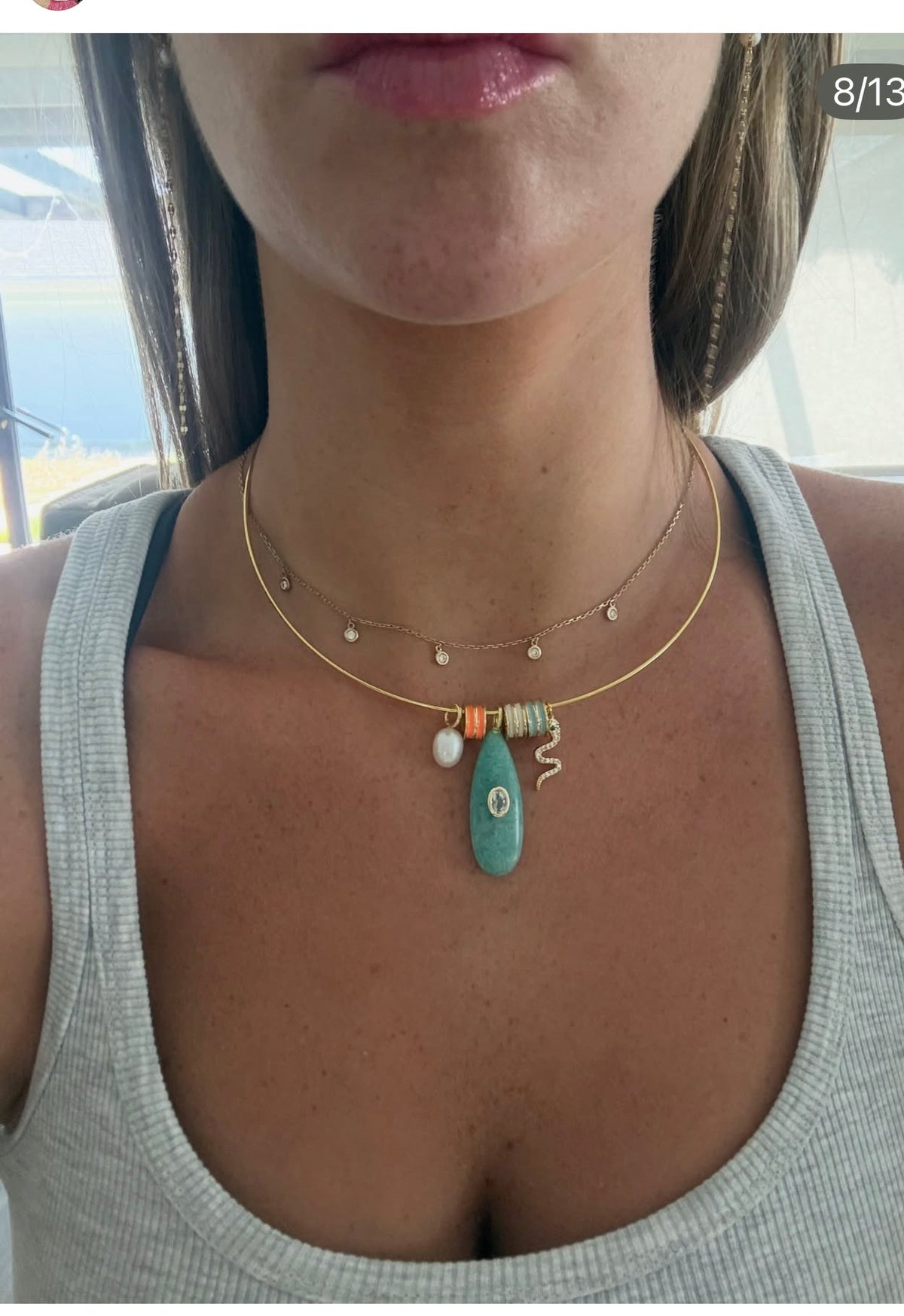 Gold bar with assorted snake & blue pendant